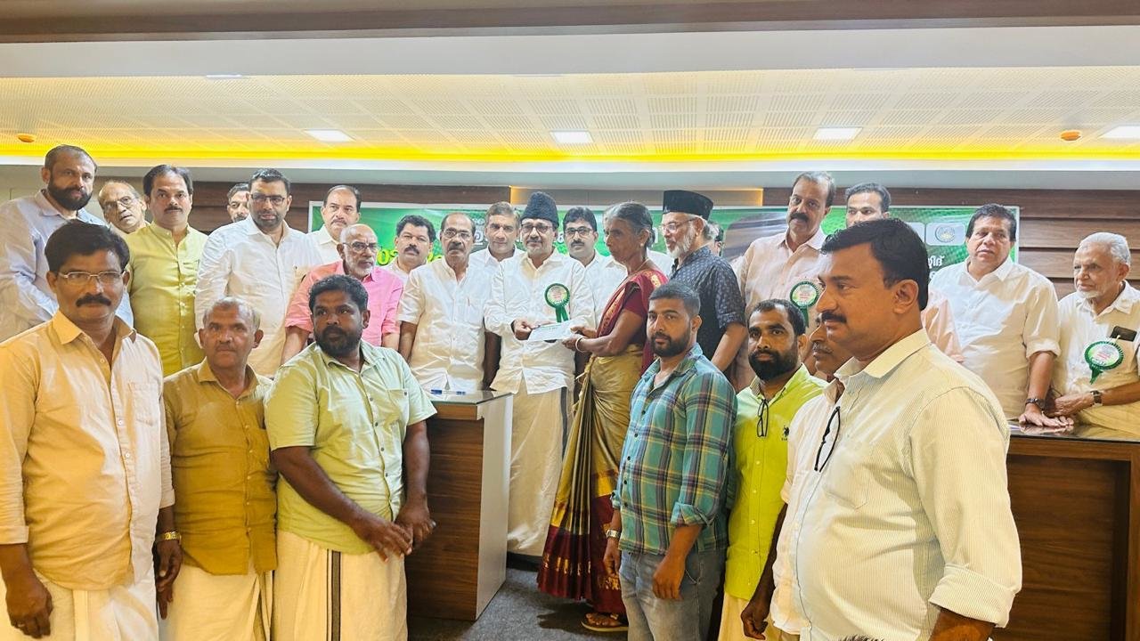 Death aid distribution at Chemmad to Narayanan Family