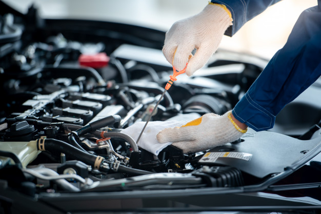 asian-car-mechanic-auto-repair-shop-is-checking-engine-customers-who-use-cars-repair-services-mechanic-will-work-garage_140555-248